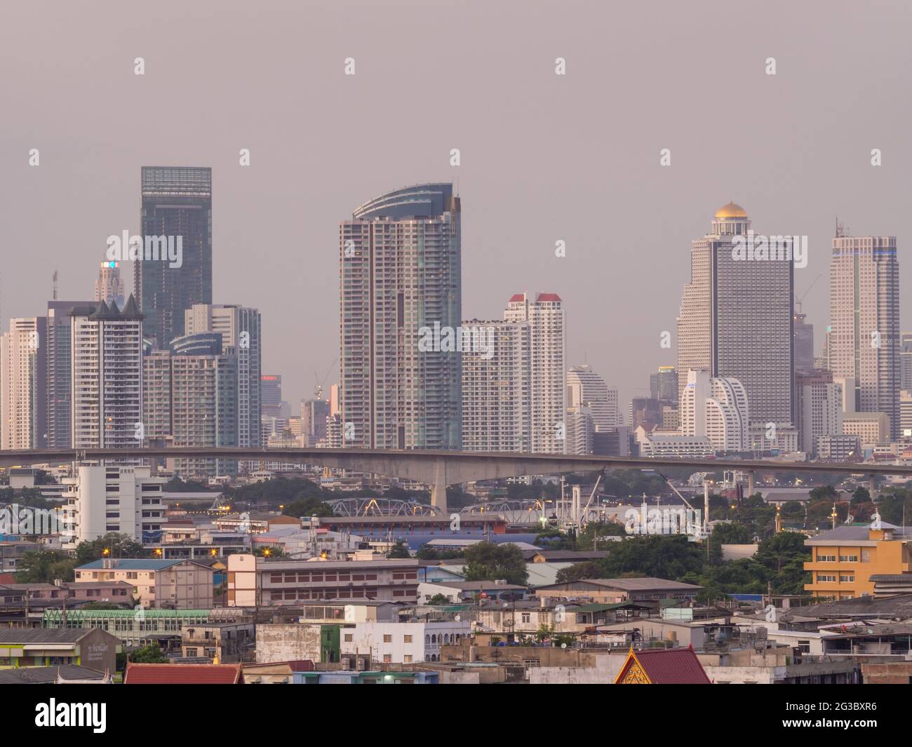 Skyscraper buildings in Bangkok under evening twilight sky Stock Photo ...