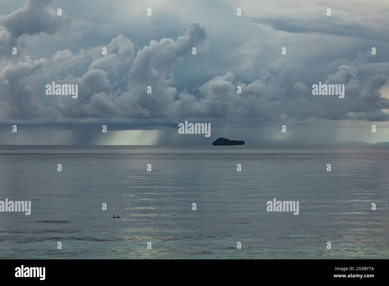 Rain in distance over ocean hi-res stock photography and images - Alamy