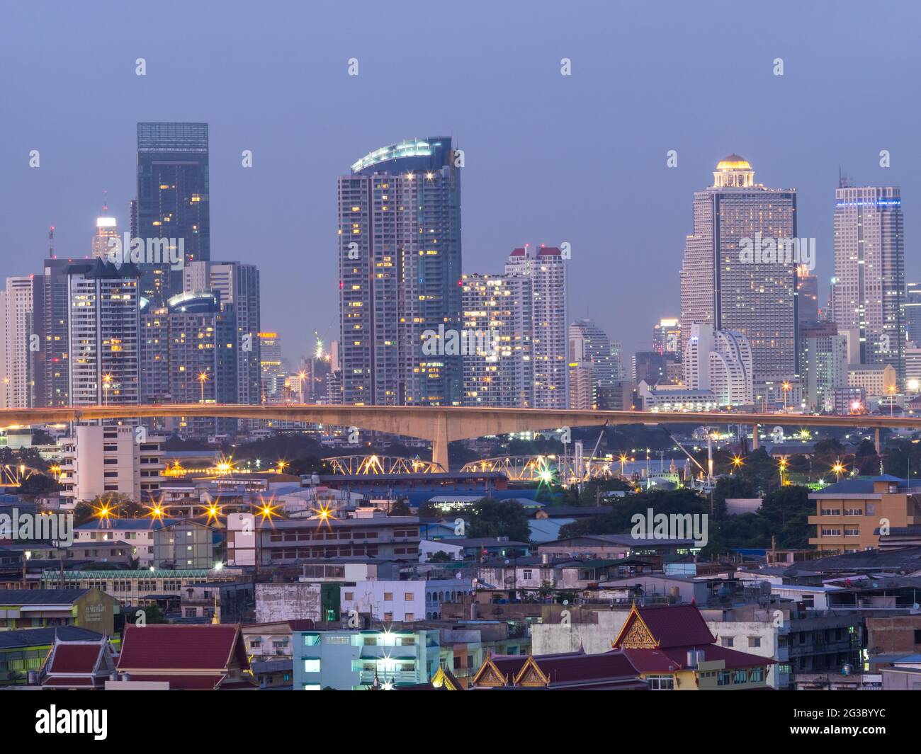 Skyscraper buildings in Bangkok under evening twilight sky Stock Photo ...