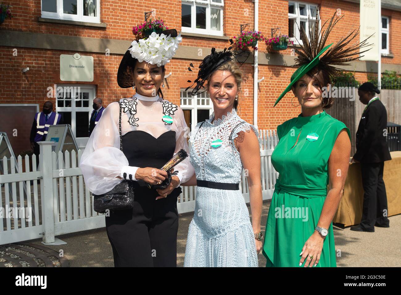 Royal Ascot Day One, Ascot, Berkshire, UK - 15 Jun 2021. Lady Wilnelia Forsyth, Lucy Woodward and Milliner Ilda Di Vico (R). Racegoers were delighted to be back at Royal Ascot again this morning. This year is a scaled down event with 12,000 racegoers per day being allowed into Ascot Racecourse following the easing of some of the Covid-19 Lockdown restrictions. Racegoers are required to provide proof of a negative Covid-19 lateral flow test before being allowed access to the course. Credit: Maureen McLean/Alamy Stock Photo