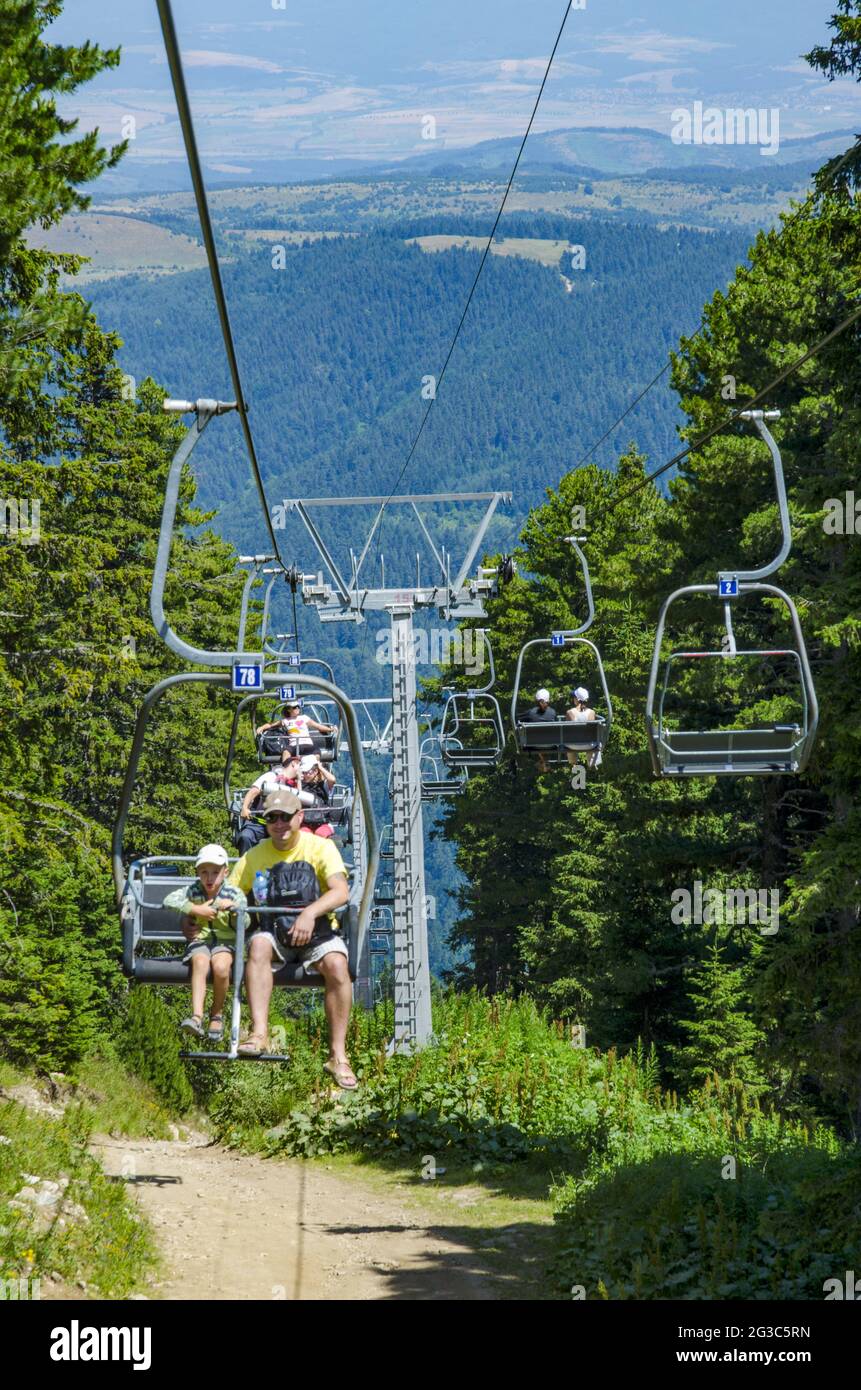 Tourists on a cable lift for the Seven Rila Lakes in Rila mountain, Bulgaria. Stock Photo