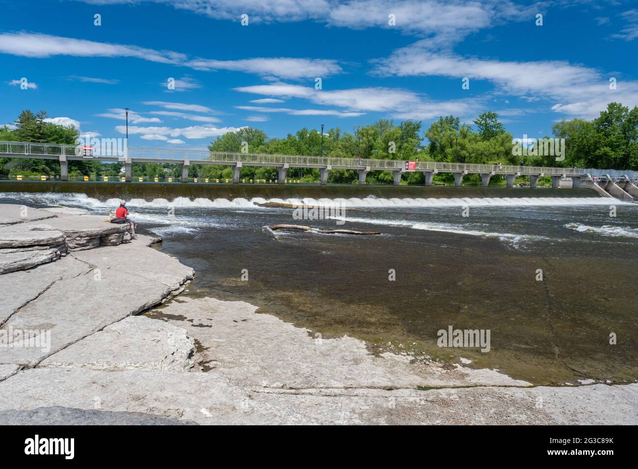 Terrebonne, Quebec, Canada - 11 June 2021: The Moulin neuf (New Mill) and Moulin-Neuf dam at the Île-des-moulins Stock Photo