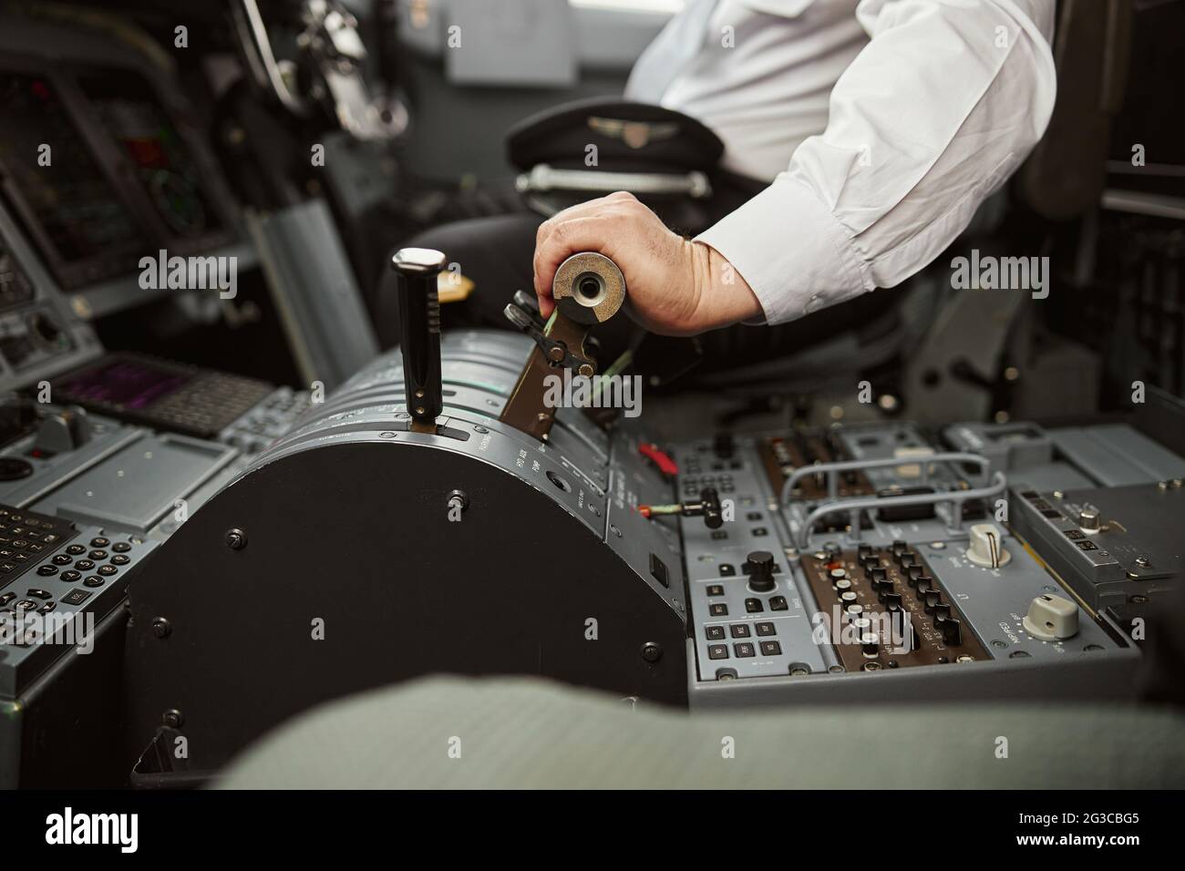 Pilot use steering to fly on passenger airplane Stock Photo Alamy