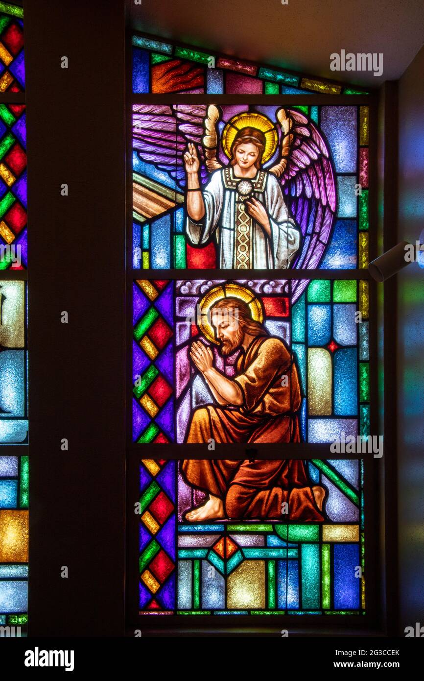 Praying angel stained glass hi-res stock photography and
