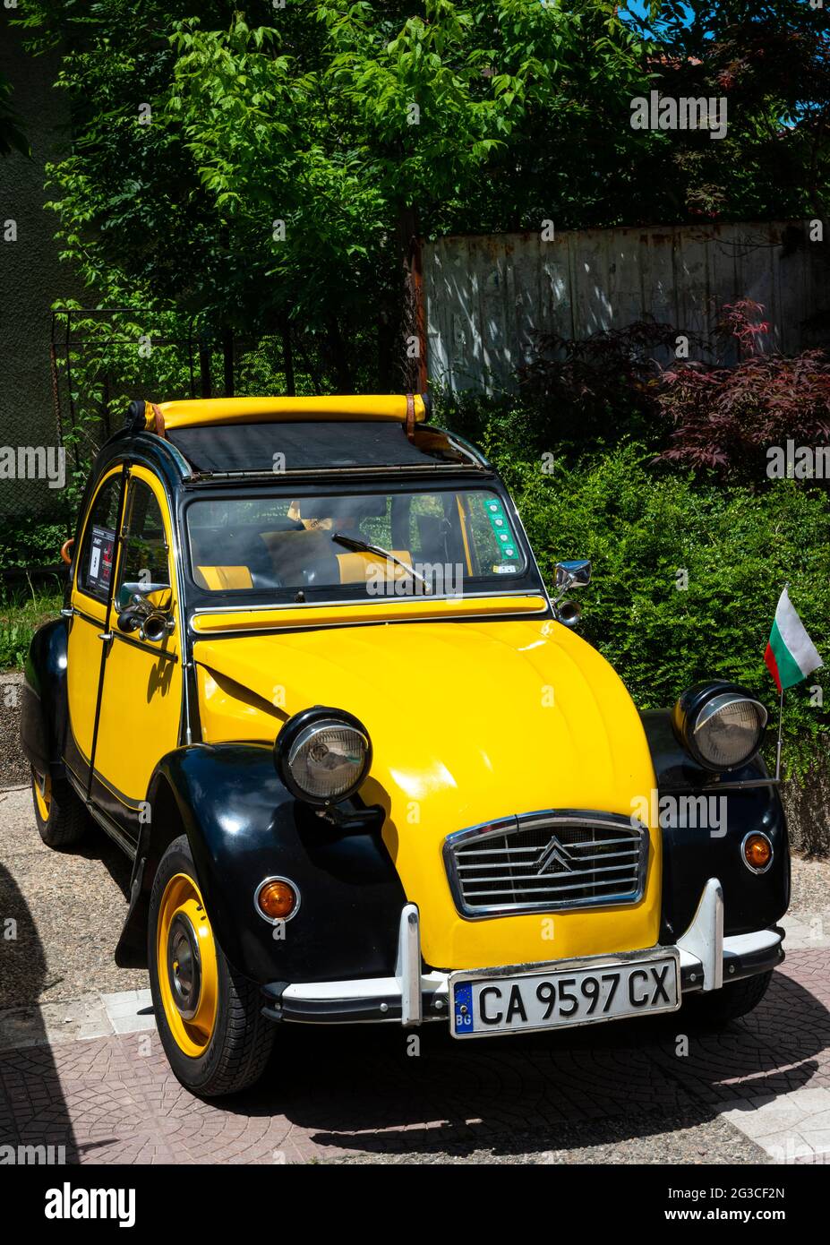 Yellow and black 1982 Citroën 2CV car in great condition during the annual retro car parade in Bulgaria as of May 2021 Stock Photo
