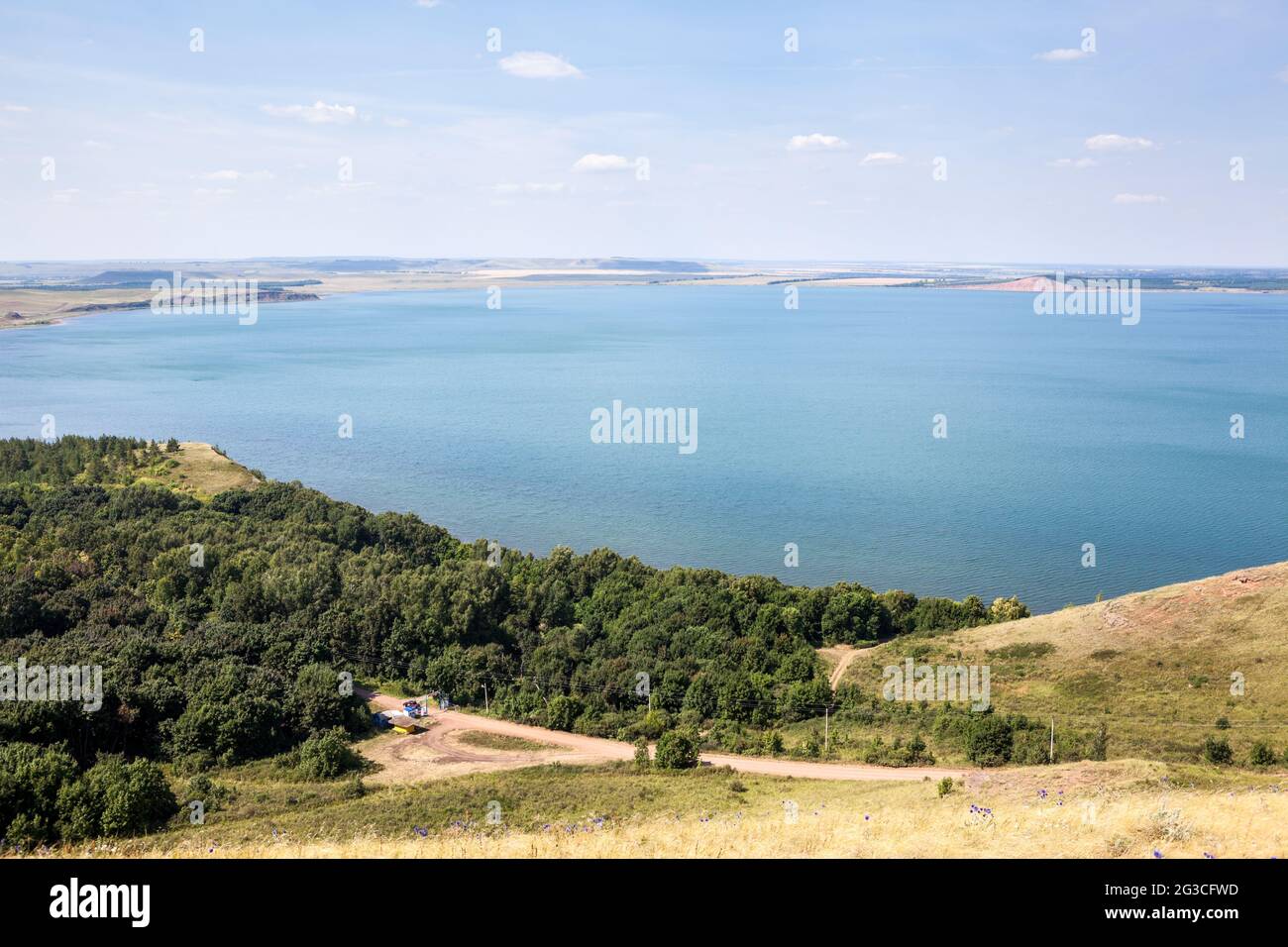 The largest Aslikul lake, karst and sinkhole, shore with hills, panorama. The Republic of Bashkortostan, Russia Stock Photo