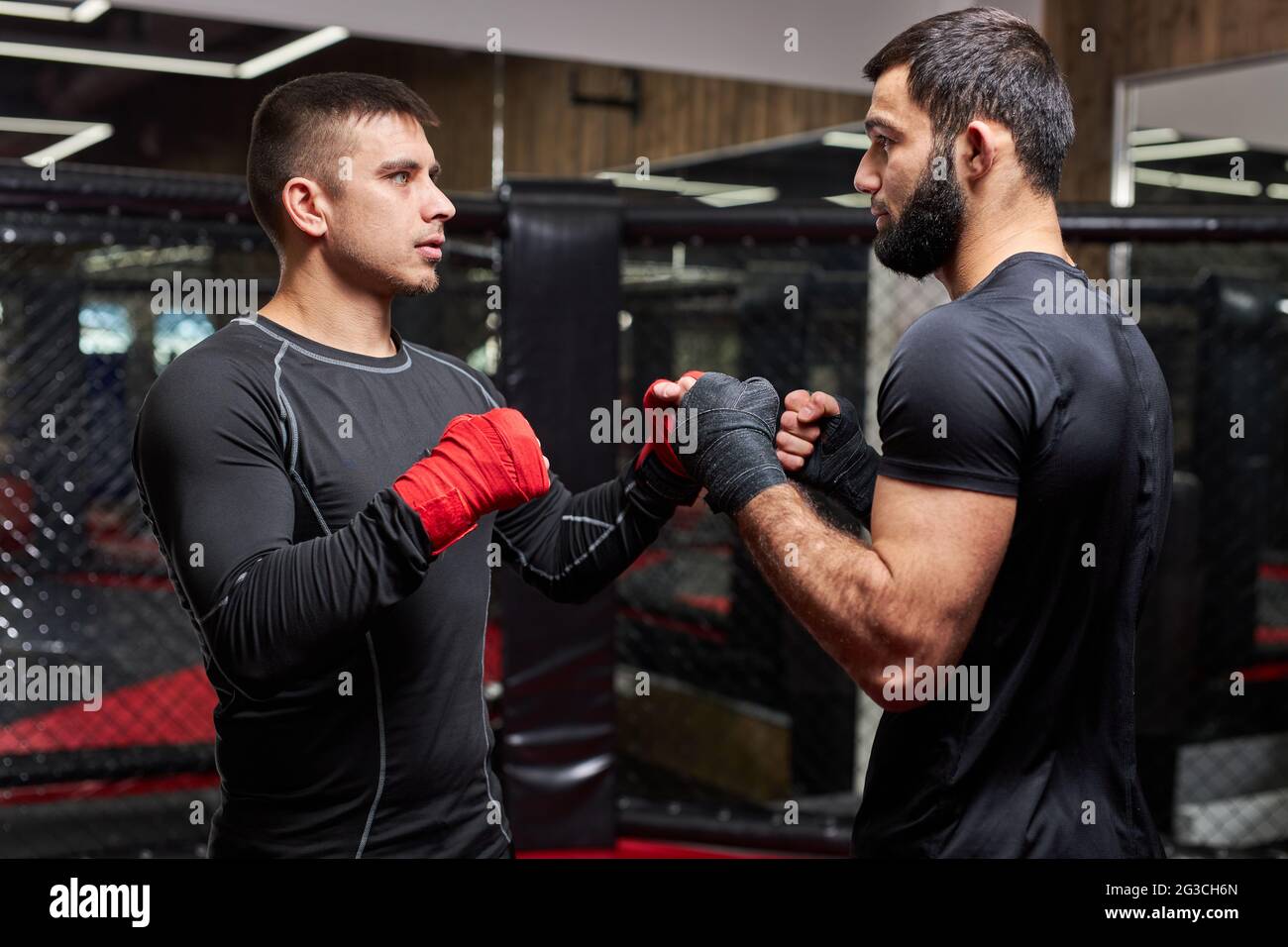 Professional MMA Fighter Showing Best Tricks To New Fighter, Teaching,  Training Together, Engaged In Workout, Master Class By Professional MMA  Wrestle Stock Photo - Alamy