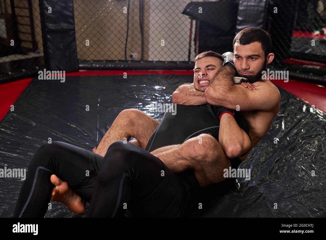 Two men grappling hires stock photography and images Alamy