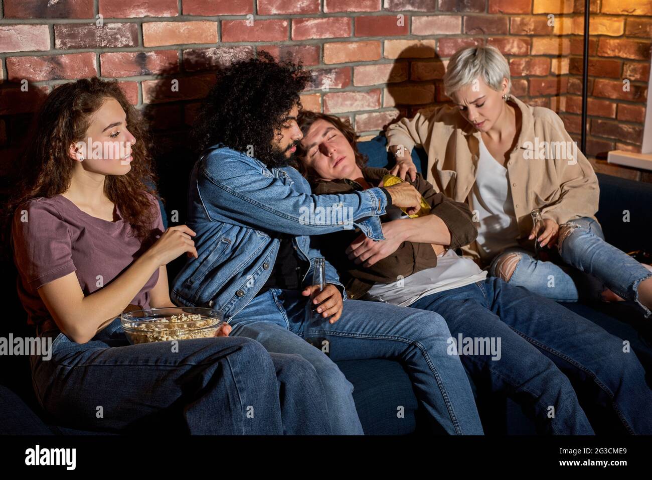 Bored Guy Sleeping While Diverse Friends Watching Movie Online On TV, At  Home, Sitting On Sofa, At Night, Fall Asleep During Movie Stock Photo -  Alamy