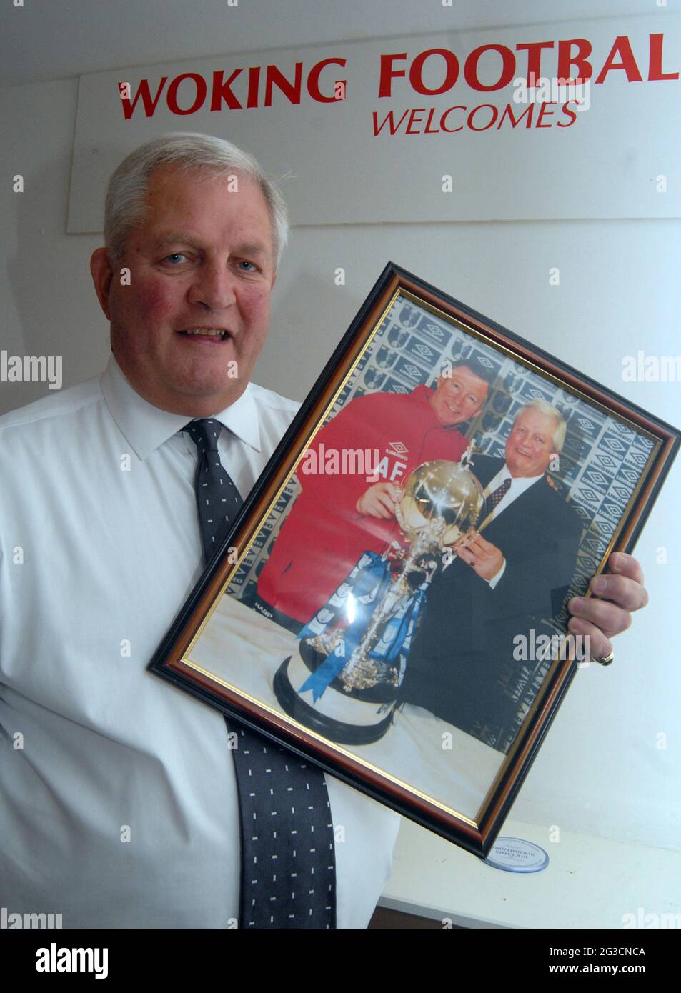 Geoff Chapple, commercial manager of Woking who face Swindon in the FA Cup this weekend, pictured with Sir Alex Ferguson. after winning the FA Trophy with Kingstonians Geoff is the most successful manager in non-league history having made the First Round 12 times and knocked out seven league clubs. Pic Mike Walker, 2009 Stock Photo