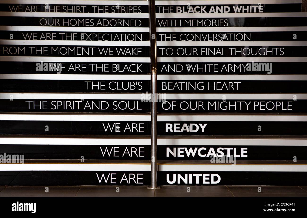 Words on the staircase which leads up to the players and official entrance at Newcastle United’s football club stadium and home ground St James’ Park Stock Photo