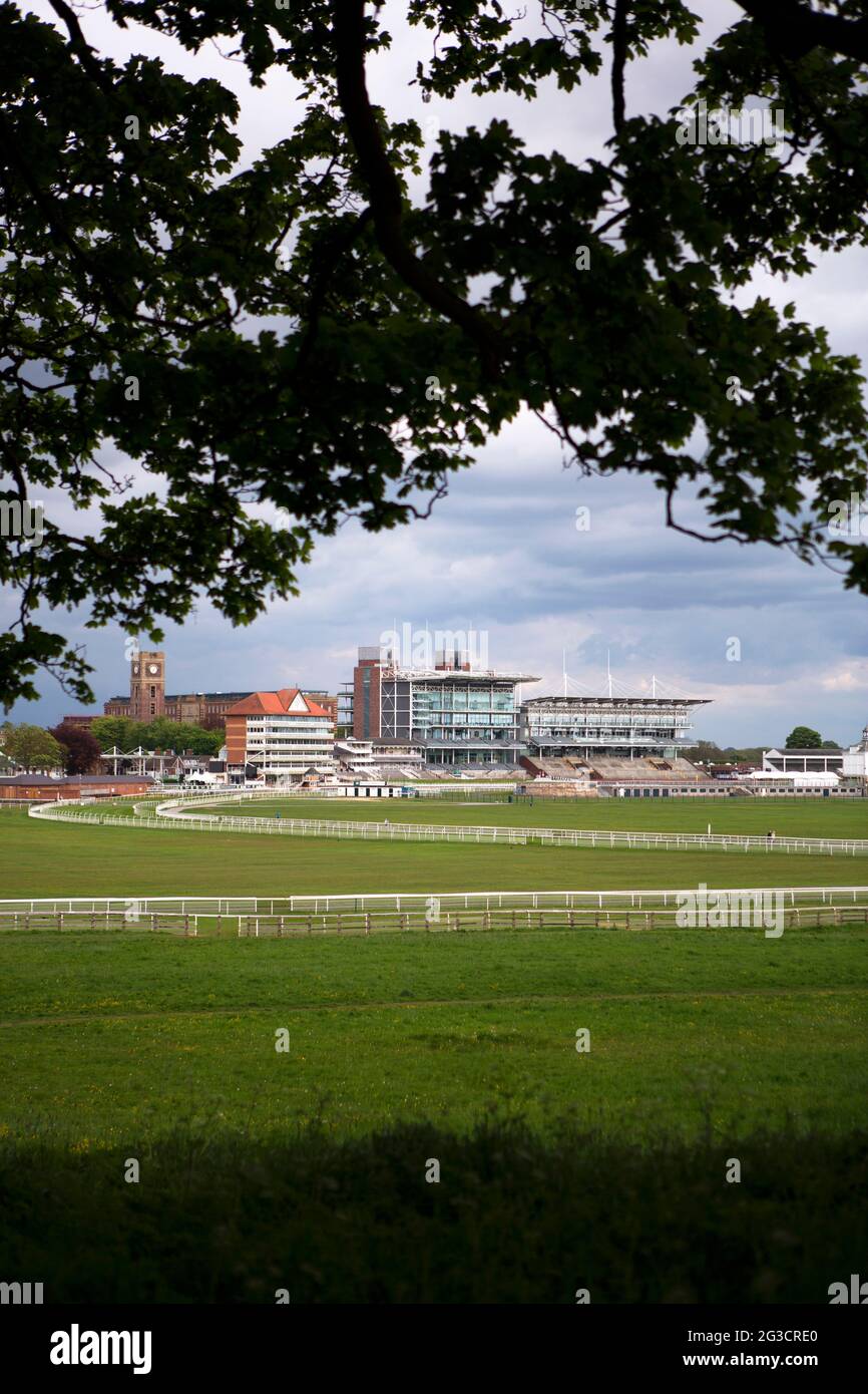 The empty and closed stands of York Racecourse. Its annual Dante festival in has already been cancelled and the larger Ebor Festival meeting which is Stock Photo