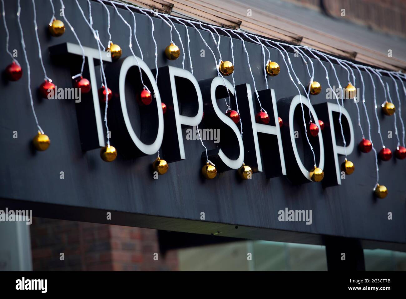 Christmas bauble decorations at Topshop and Topman owned by Arcadia in St Mary’s Square in Coppergate, York, North Yorkshire. Sir Phillip Green’s reta Stock Photo