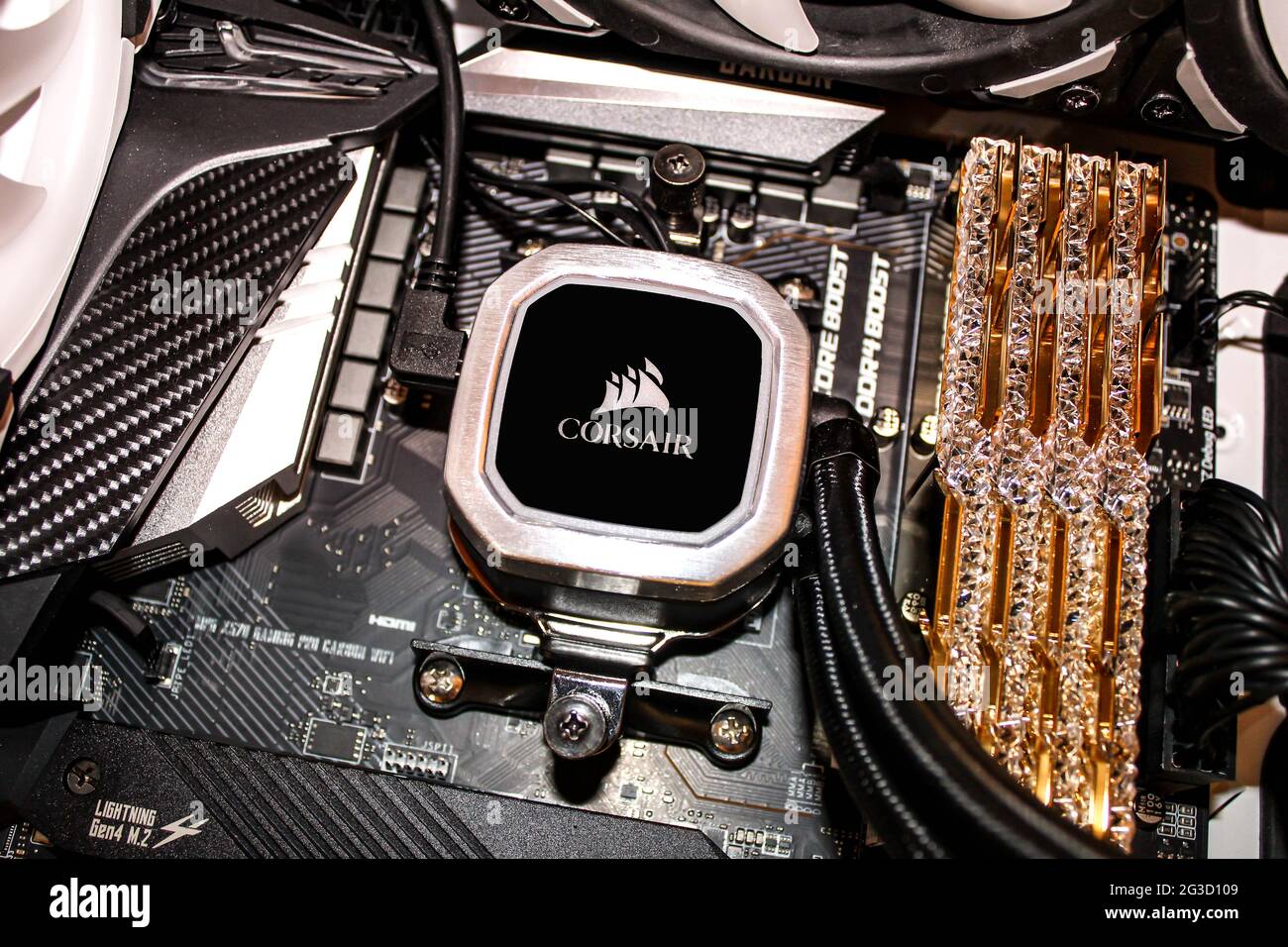 A gaming PC with Liquid CPU Cooler CORSAIR pump and G.Skill flagship Trident Z Royal series desktop memory features a crown jewel design. System memory Stock Photo