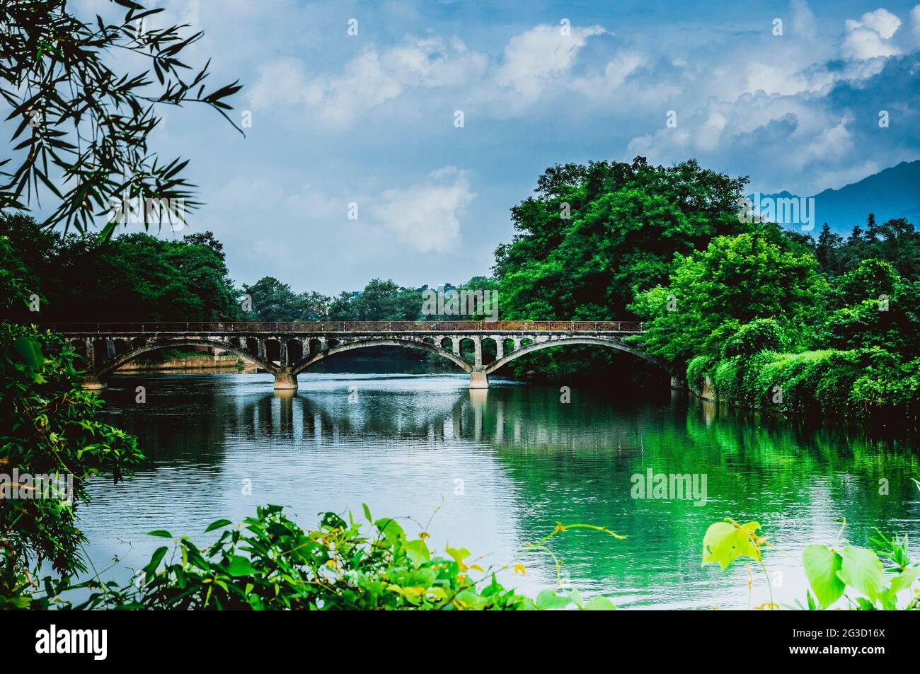 The countryside scenery with a bridge in the summer Stock Photo - Alamy