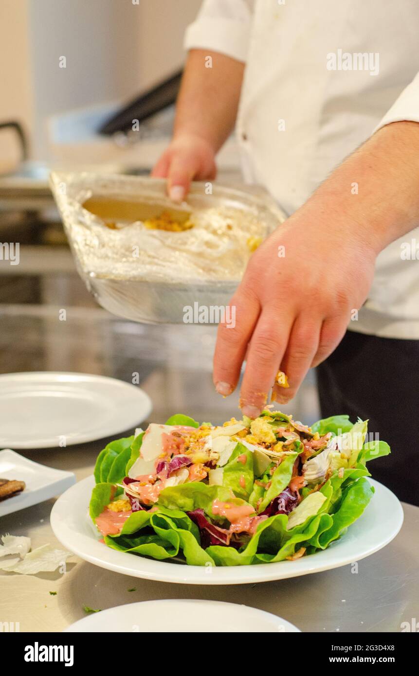 Chef preparing vegetable salad on hi-res stock photography and images ...