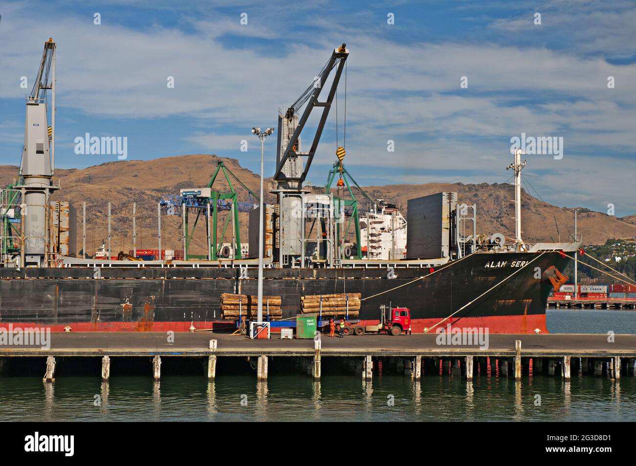 Panamaregistered bulk carrier vessel Alam Seri loading timber (lumber