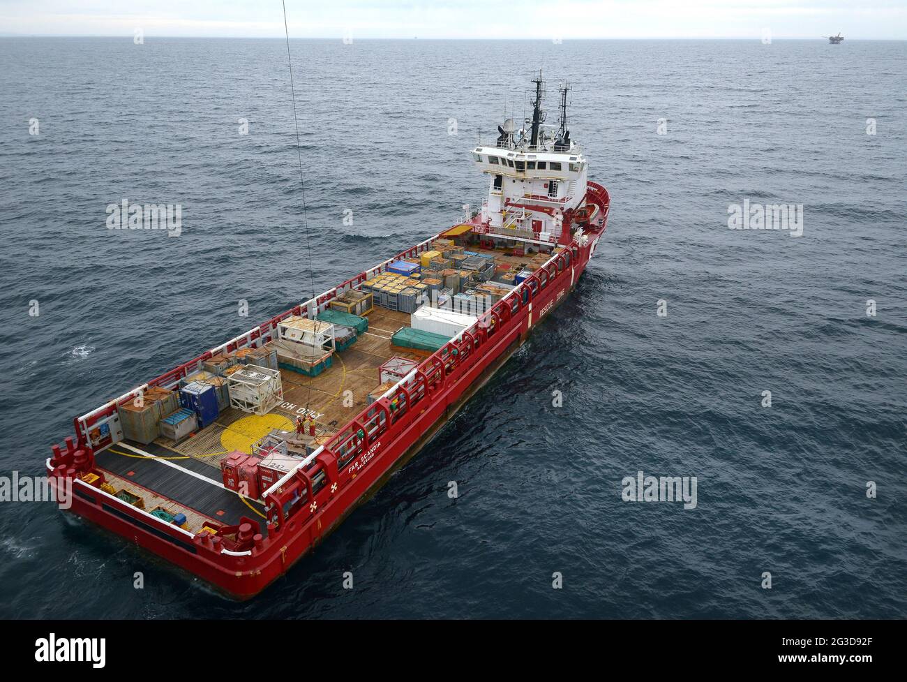 workboat on Bass Strait with oil and gas platforms operating all around. Stock Photo