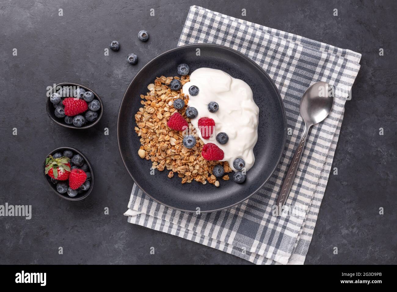 Healthy breakfast with baked granola and greek yogurt. Image Stock