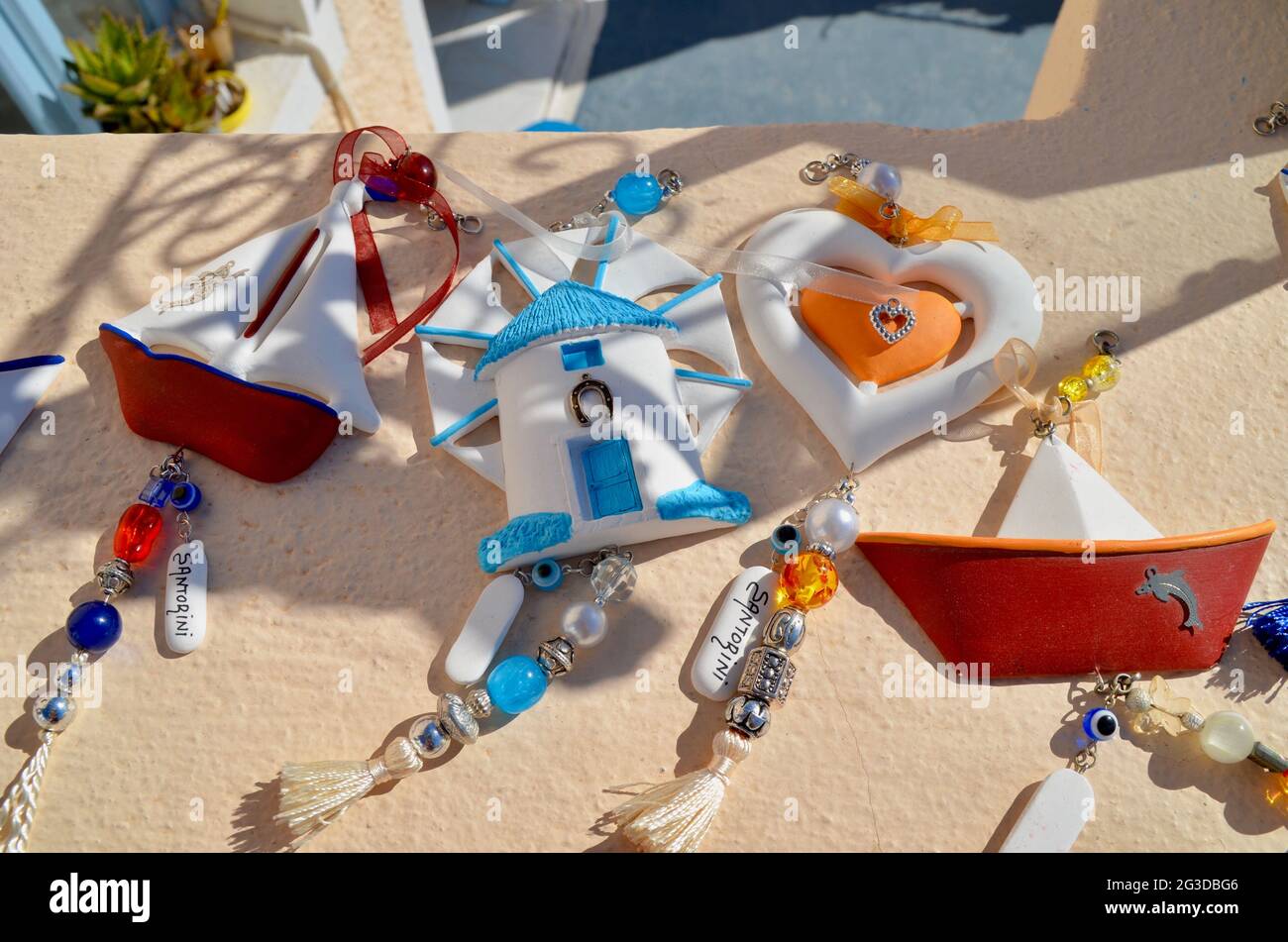Greek Souvenirs on display in the streets of Oia, Santorini, Greece Stock Photo