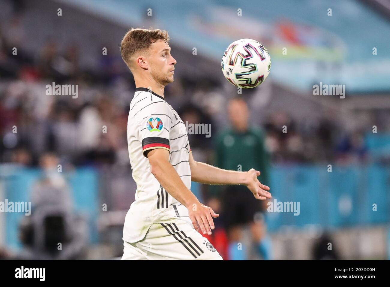 Munich, Germany. 15th June, 2021. Joshua Kimmich of Germany controls the ball during the UEFA Euro 2020 Championship Group F match between France and Germany in Munich, Germany, June 15, 2021. Credit: Shan Yuqi/Xinhua/Alamy Live News Stock Photo
