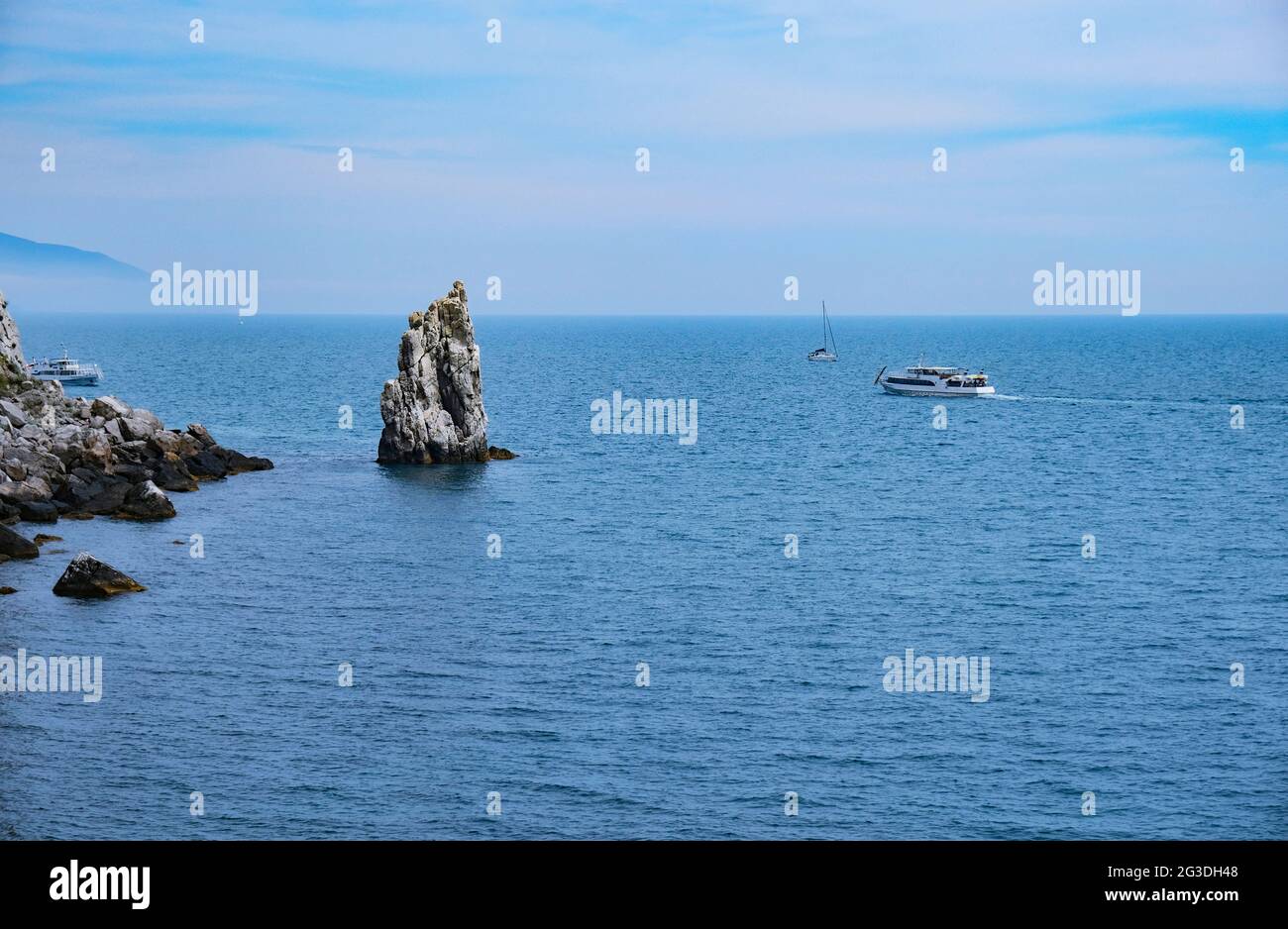 Panoramic view of blue sea, sky and mountains. Travel concept. Stock Photo
