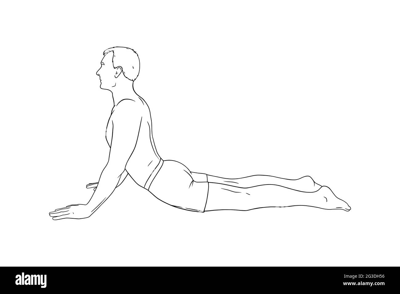 Young man is doing bhujangasana cobra yoga pose