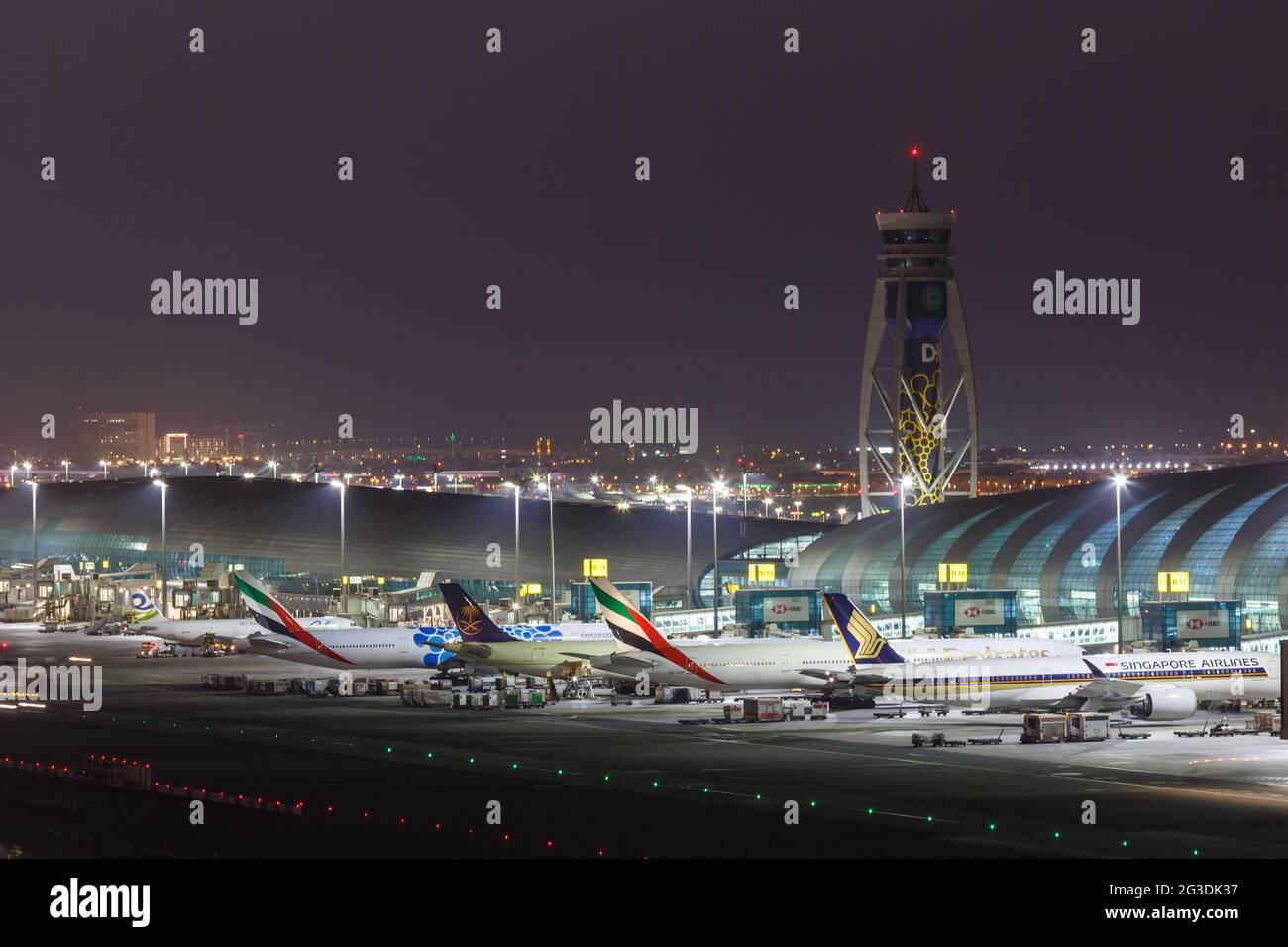 Dubai, United Arab Emirates - May 27, 2021: Airplanes at Dubai airport (DXB) in the United Arab Emirates. Stock Photo