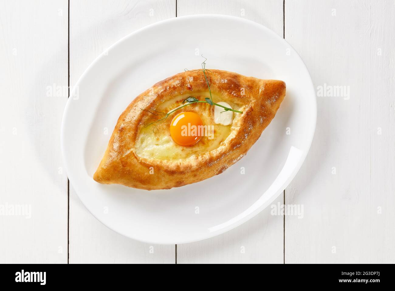 Adjarian Khachapuri With Cheese Butter And Egg Yolk Stock Photo Alamy