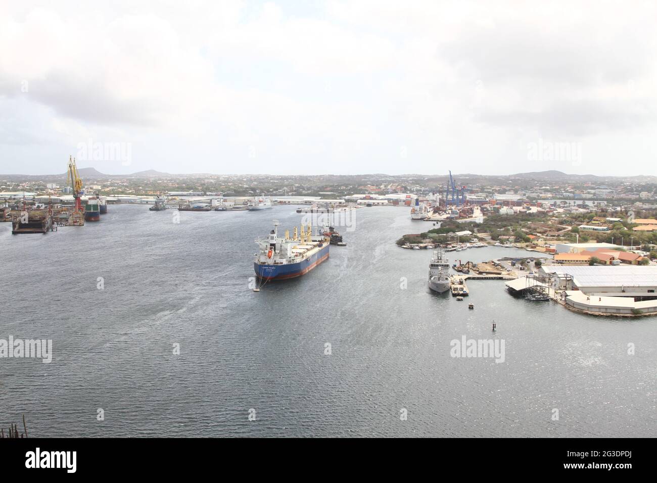 Port and industrial area on the Caribbean Island of Curacao, Dutch Caribbean . Also known as part of the ABC Islands. Cargo shipping traffic. Oil terminal. Willemstad. Stock Photo