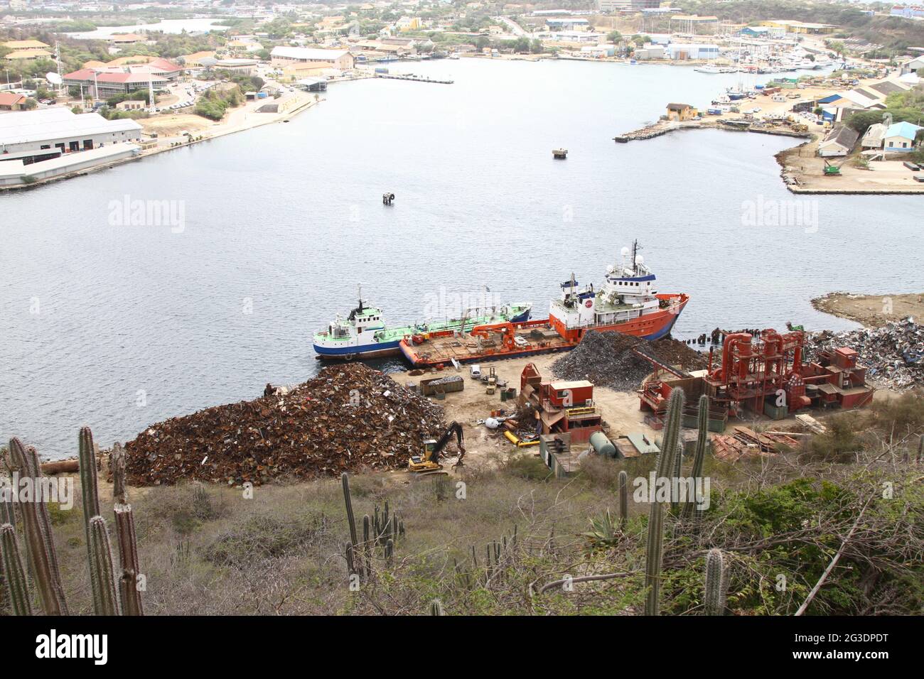 Scrap metal to be loaded on cargo ships on the Caribbean Island of Curacao. Recycling. Stock Photo