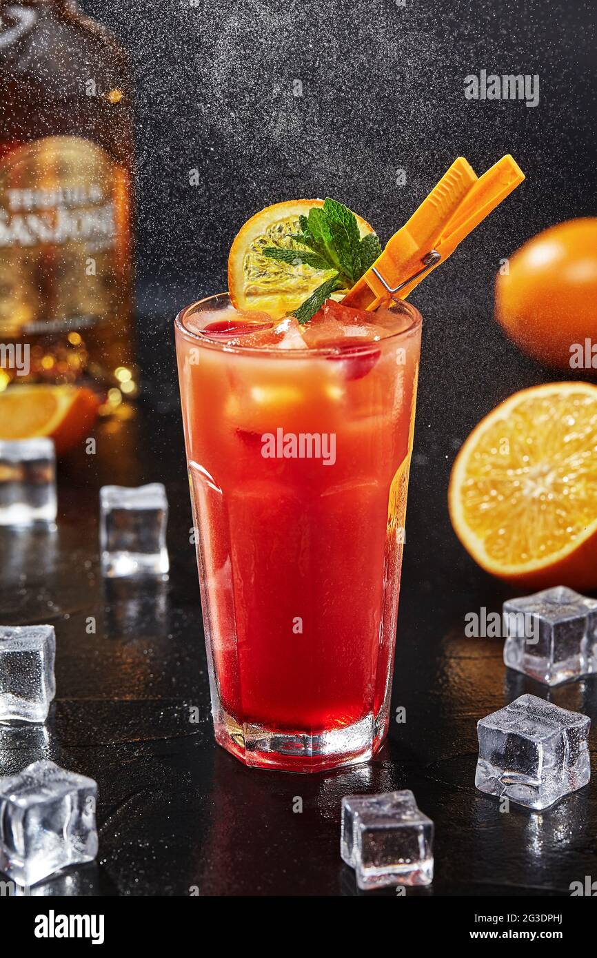 Cocktail tequila sunrise with grenadine syrup, orange juice, tequila