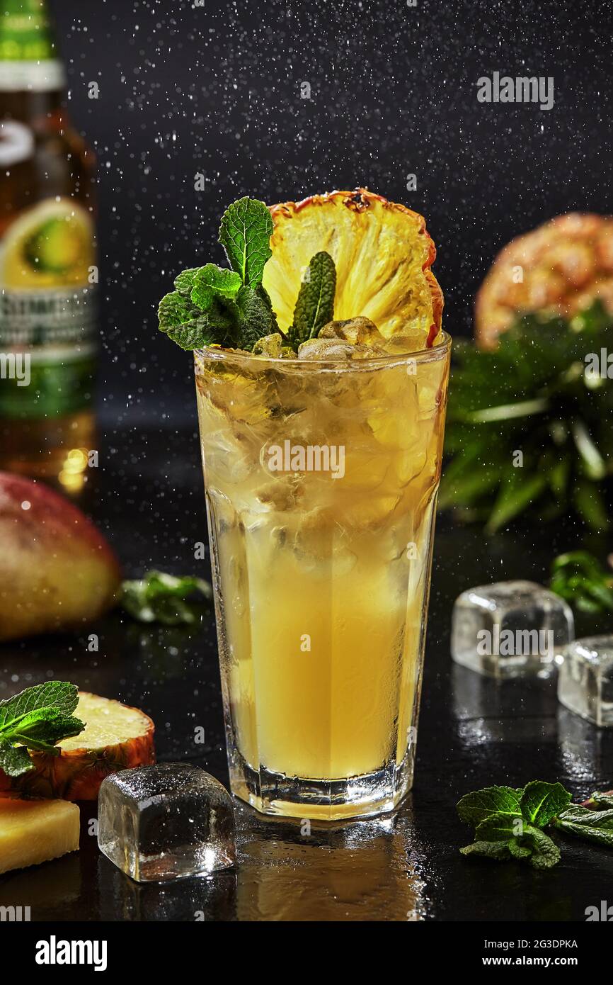 Whiskey based cocktail with yuzu puree, spicy mango syrup, apple cider