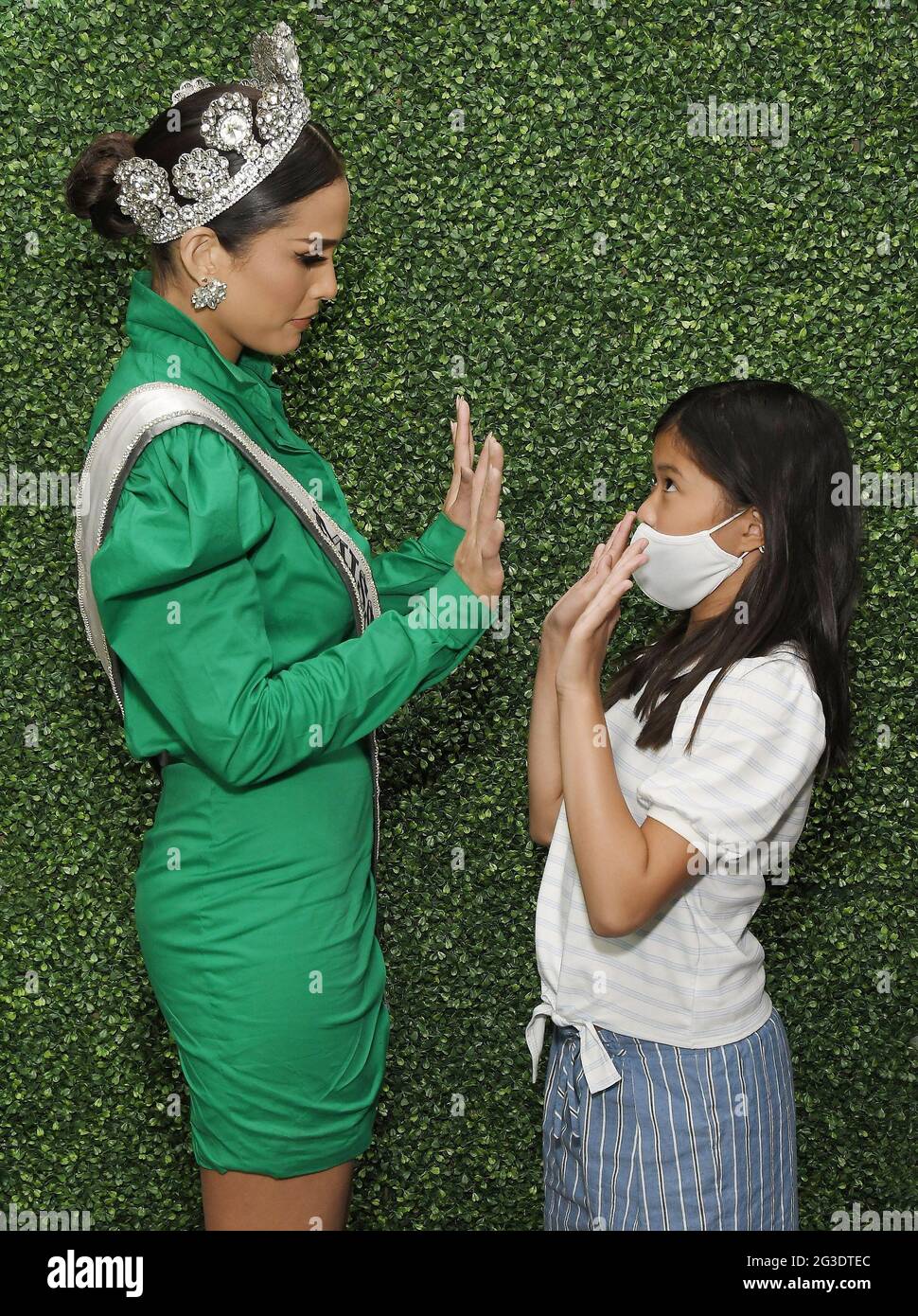 Los Angeles, USA. 15th June, 2021. Miss Universe Peru 2020 Janick Maceta Del Castillo plays with a little fan at her meet & greet held at O Skin Med Spa in Cerritos, CA on Tuesday, ?June 15, 2021. (Photo By Sthanlee B. Mirador/Sipa USA) Credit: Sipa USA/Alamy Live News Stock Photo