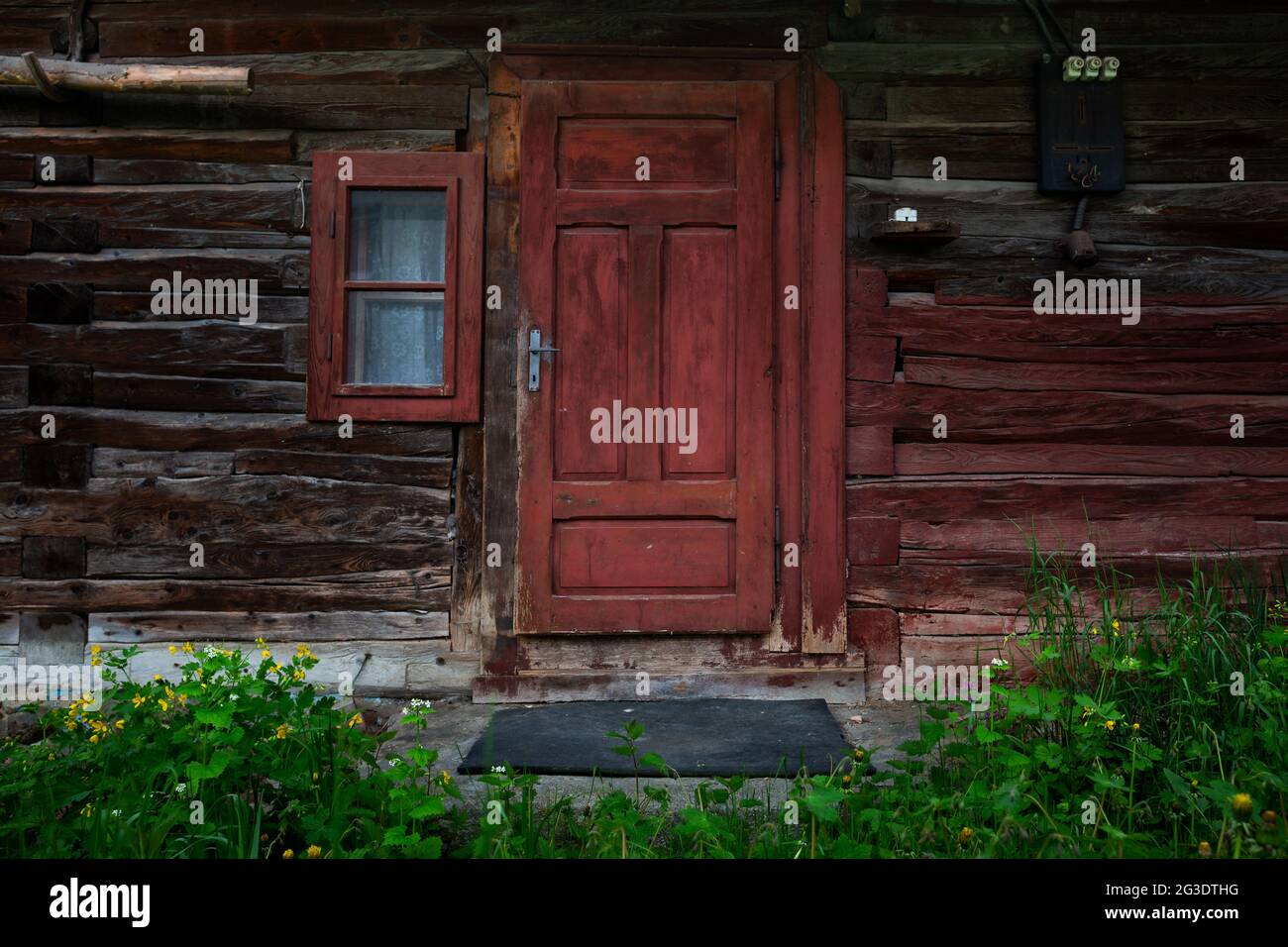 Old abandoned log cabin in Sutovo village, Slovakia. Stock Photo
