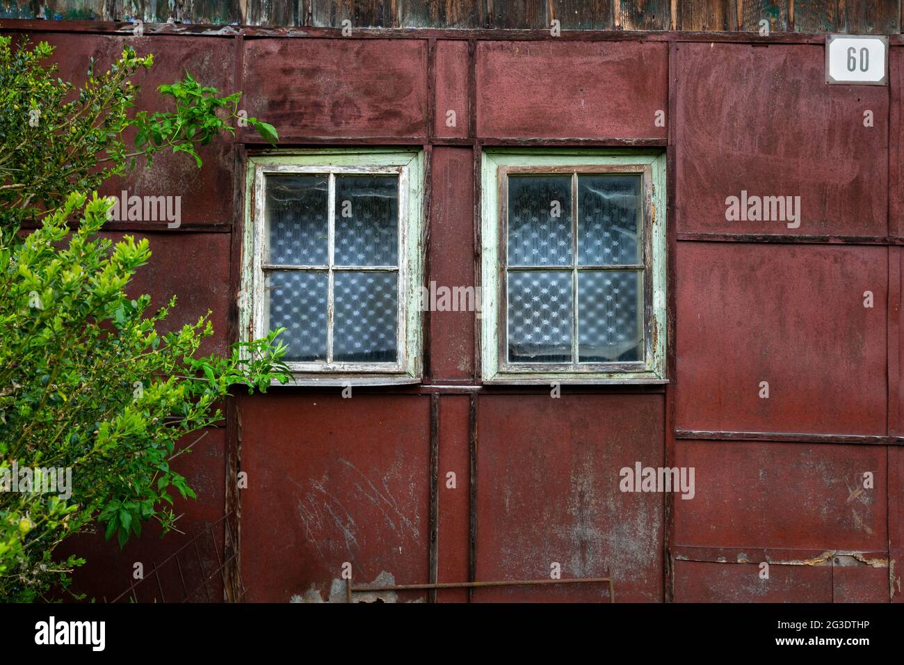 Old abandoned log cabin in Sutovo village, Slovakia. Stock Photo