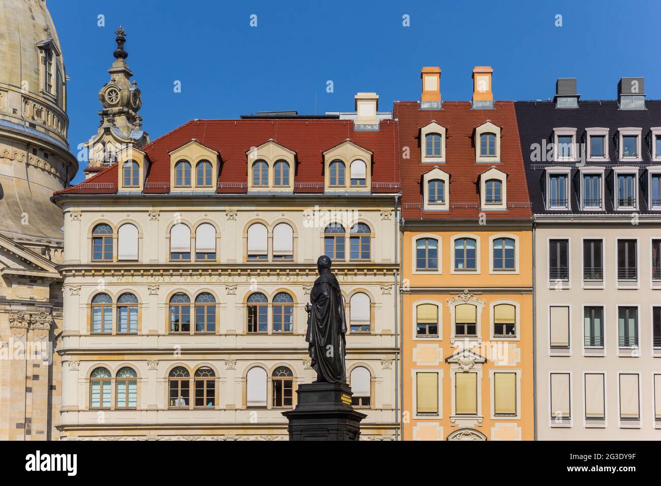 Statue in front of colorful houses in Dresden, Germany Stock Photo Alamy