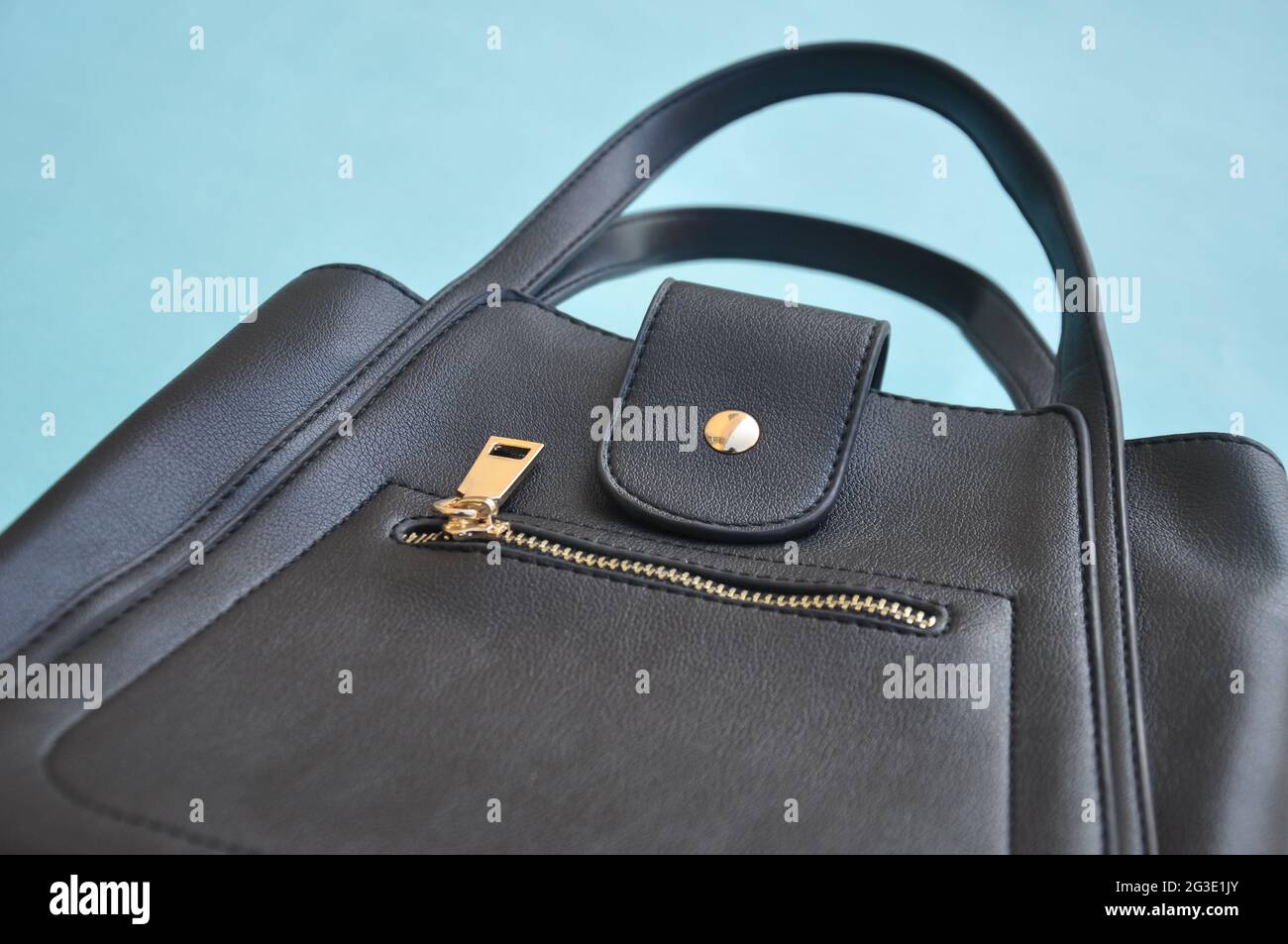 Low angle view of black color leather handbag Stock Photo