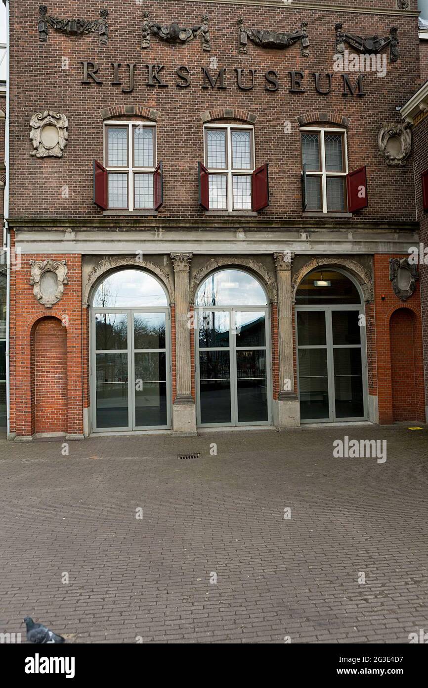 Exterior fragment building (Philips wing) with three arches from the house  of Constantijn Huygens, above the Rijksmuseum windows Stock Photo - Alamy
