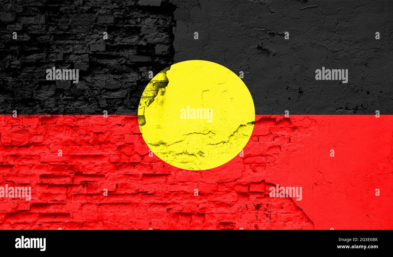 Australian Aboriginal flag is painted onto an old brick wall Stock ...