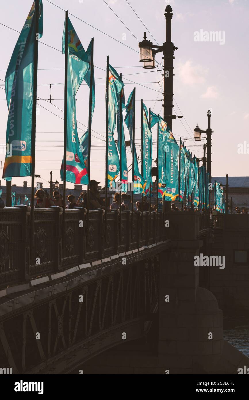 Saint-Petersburg, Russia - June 12, 2021: Row of UEFA flags with the symbols of the Euro 2020 football championship on the railing of the bridge Stock Photo
