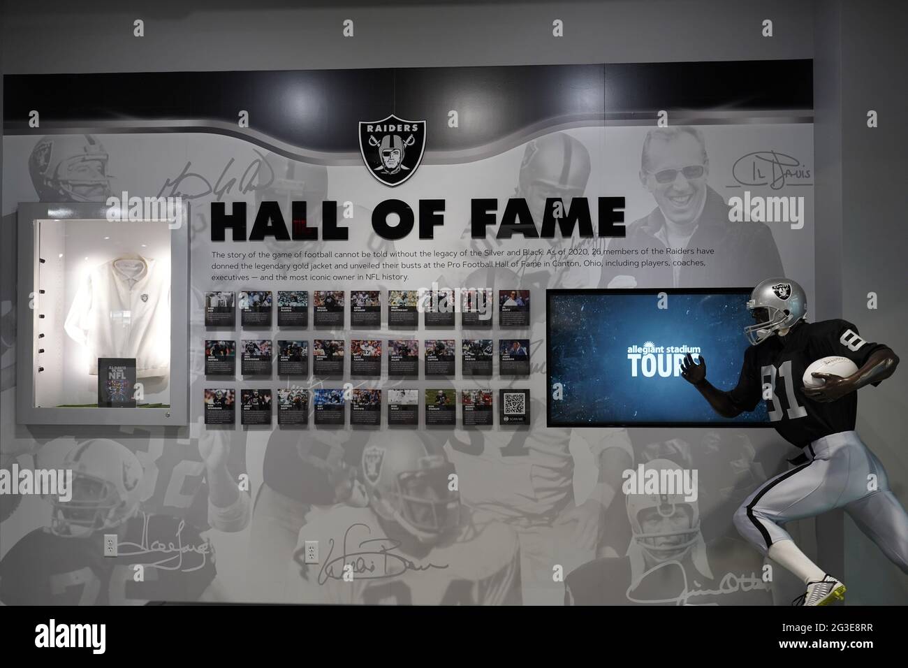 A man poses inside the Raider Image team store at Allegiant Stadium, Sunday  March 7, 2021, in Las Vegas. The stadium is the home of the Las Vegas  Raiders and the UNLV