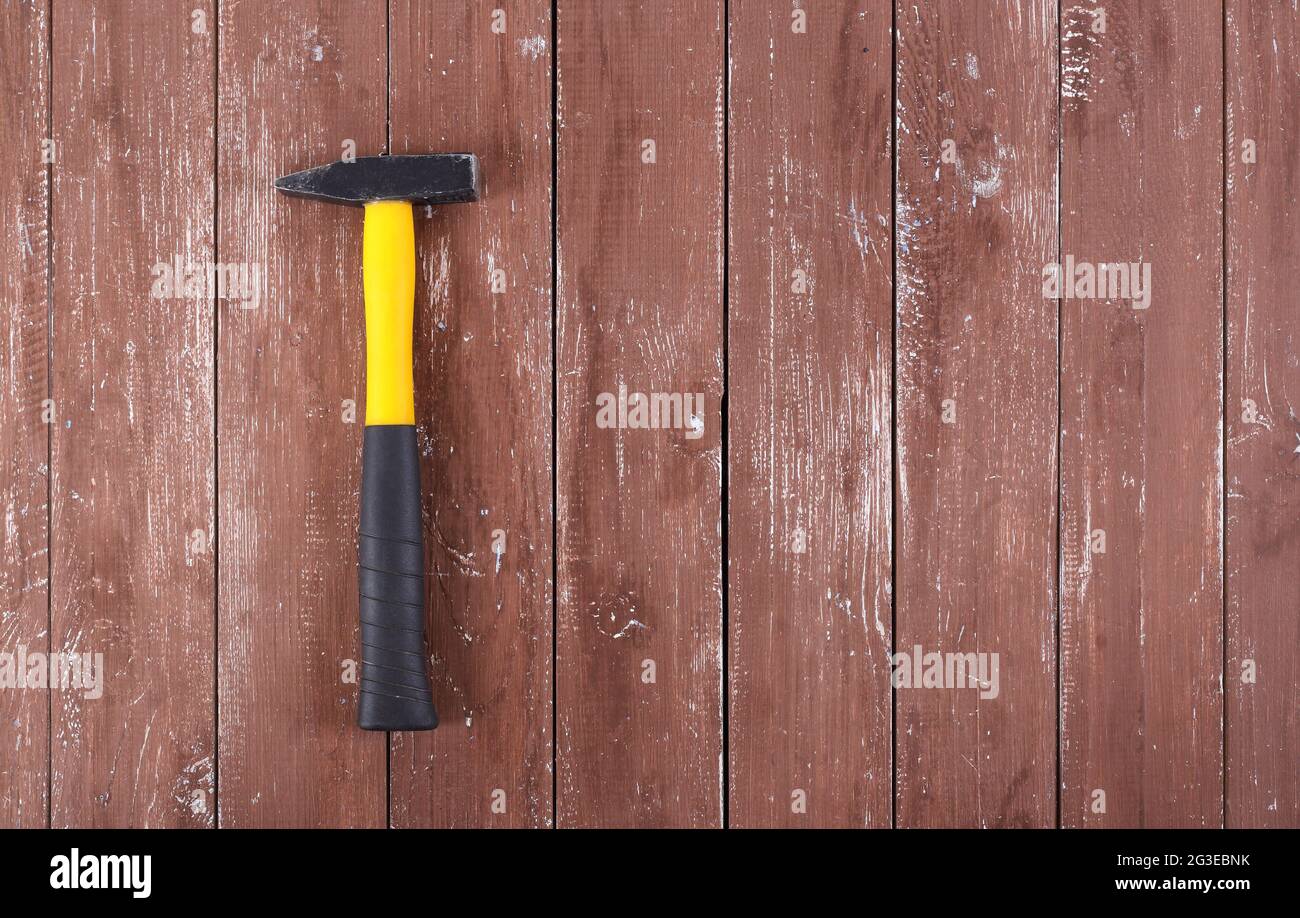 Tools Building and repair Top view big hammer on a wooden background Stock Photo Alamy