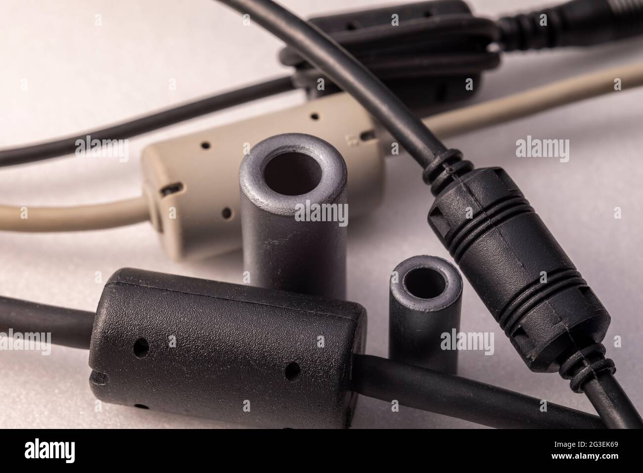 Close up of a ferrite bead inductor. An electrical element that suppresses high-frequency electronic noise in electronic circuits. Stock Photo