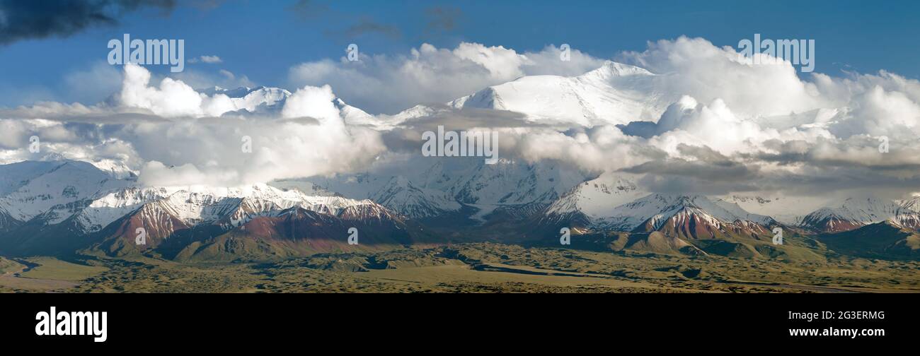 Panoramic view of Lenin Peak from Alay range - Kyrgyz Pamir Mountains - Kyrgyzstan and Tajikistan border- Central Asia 'Roof of the World' Stock Photo