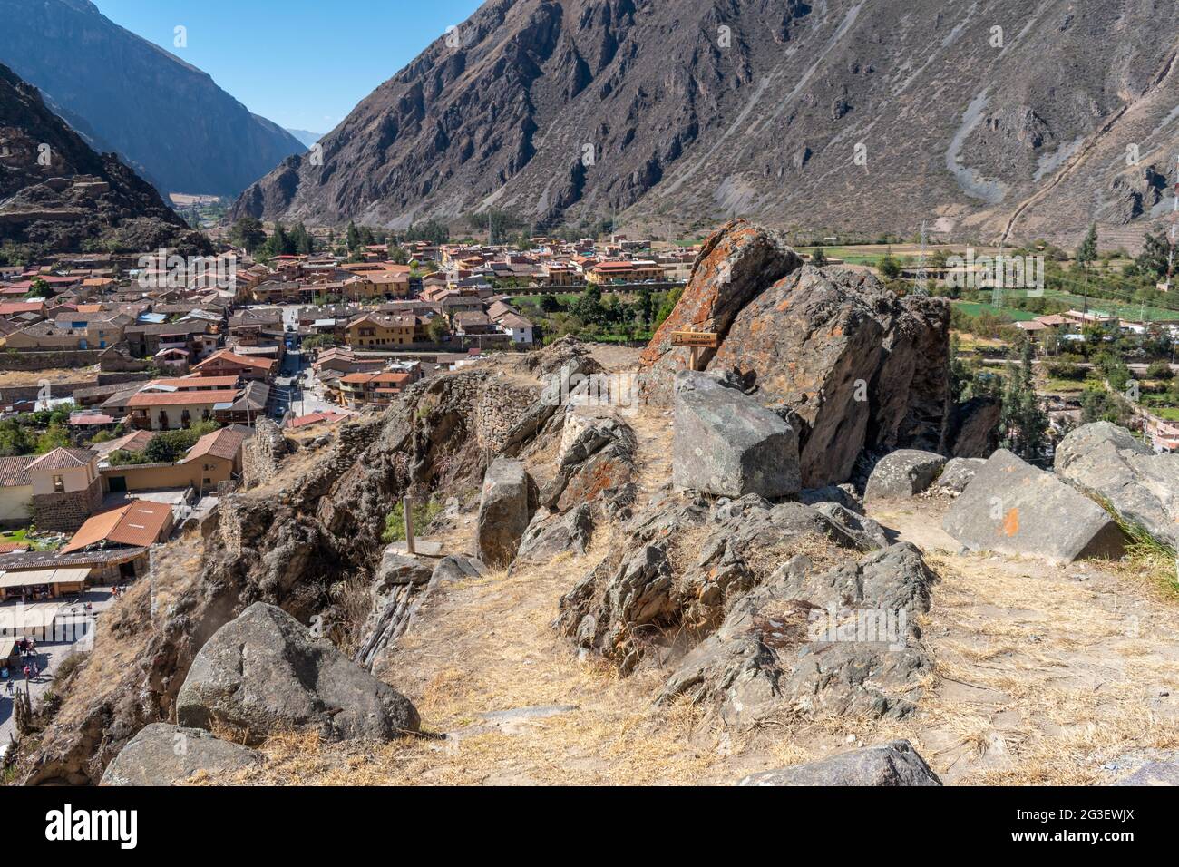 Scenic view looking over pre-Inca ruins to the town of Ollantaytambo, Sacred Valley, Peru Stock Photo