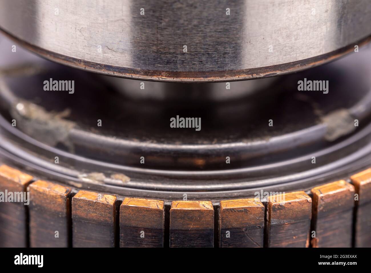 Copper commutator bar of the electric motor close up. Electric motor
