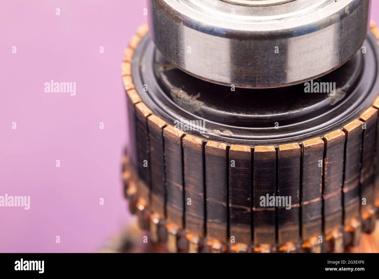 Copper commutator bar of the electric motor close up. Electric motor
