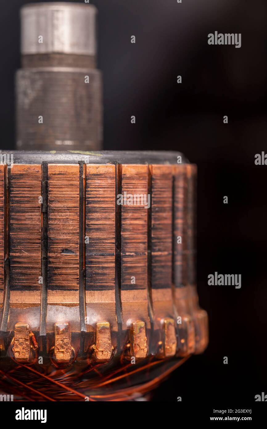 Copper commutator bar of the electric motor close up. Electric motor