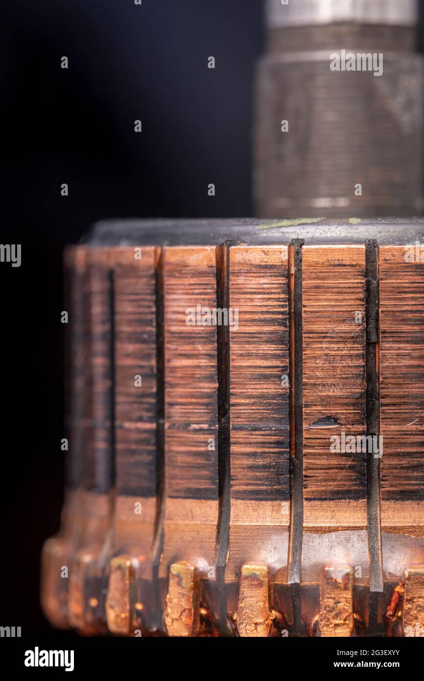 Copper commutator bar of the electric motor close up. Electric motor